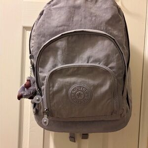 Kipling light purple expandable Backpack with monkey charm